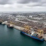 UAE Infrastructure Threat: Gulf Grid War Explodes MQ news logo on the industrial port view