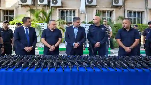 Israeli security officials and minister Itamar Ben-Gvir inspect firearm distribution in West Bank settlements