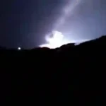 Middle East Flashpoint: Massive night flash and explosion visible over coastal ridgeline in Sirik southern Iran