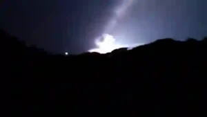 Middle East Flashpoint: Massive night flash and explosion visible over coastal ridgeline in Sirik southern Iran