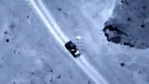 Thermal drone targeting military vehicle